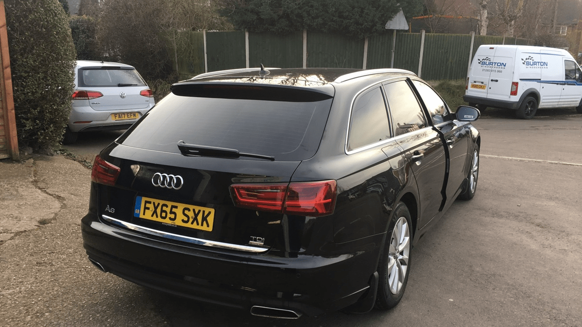 Black Audi with tinted windows