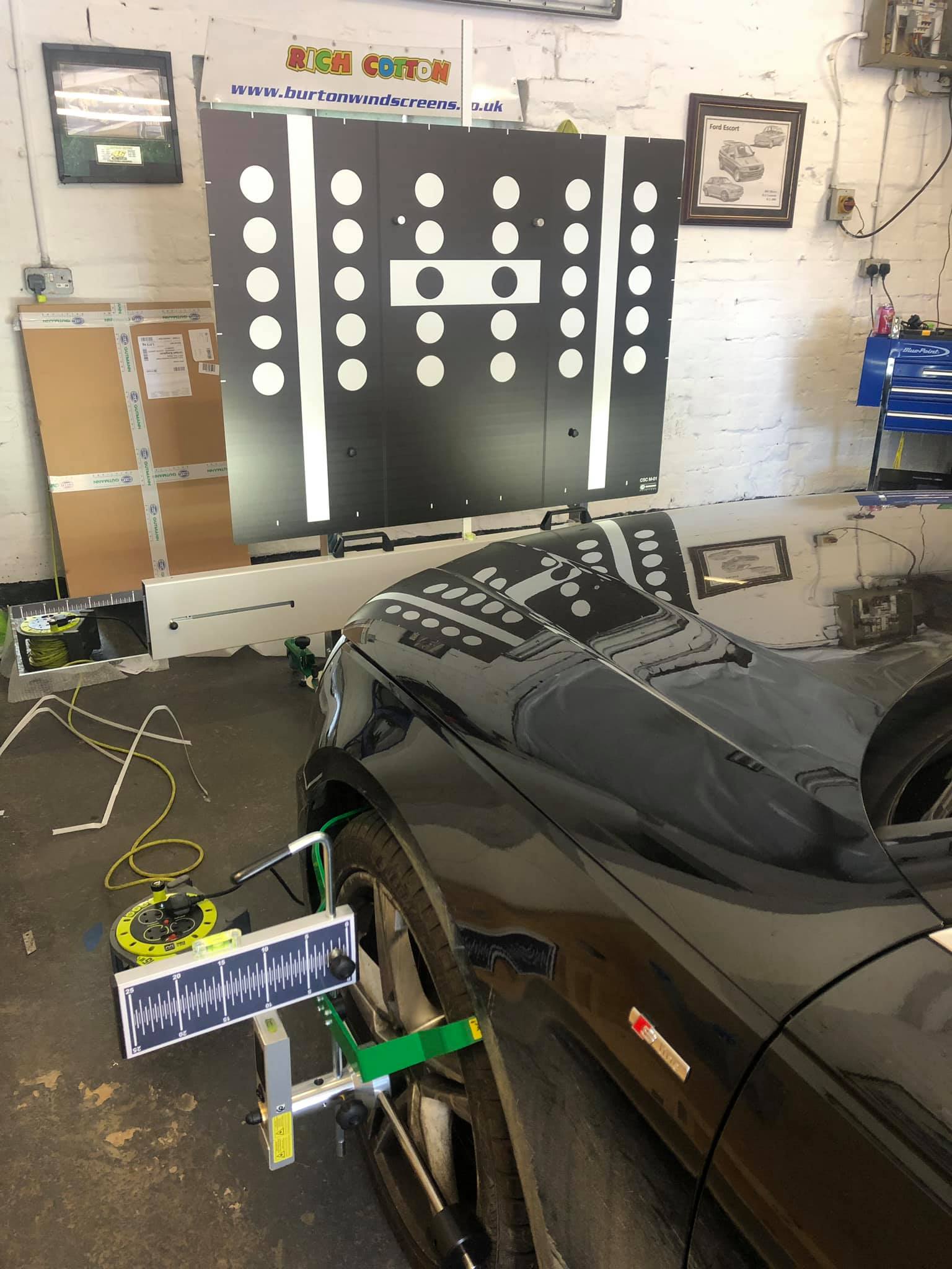 Vehicle undergoing ADAS calibration